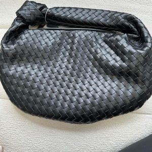Black woven knot bag